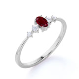 Dainty Oval Shape Ruby and 5 Stone Diamond Tapered Shank Engagement Ring in White Gold