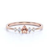 Petite 0.49 Carat Pear Salmon Morganite and 5 Stone Diamond Tapered Shank Engagement Ring in Rose Gold