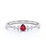 Petite 0.49 Carat Pear Ruby and 5 Stone Diamond Tapered Shank Engagement Ring in White Gold