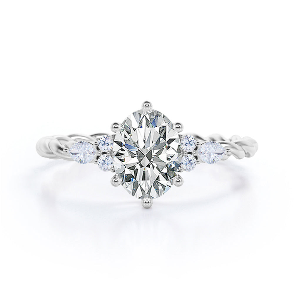 Twisted Rope Shank 0.55 carat Oval Moissanite and Diamond Engagement Ring in Rose Gold