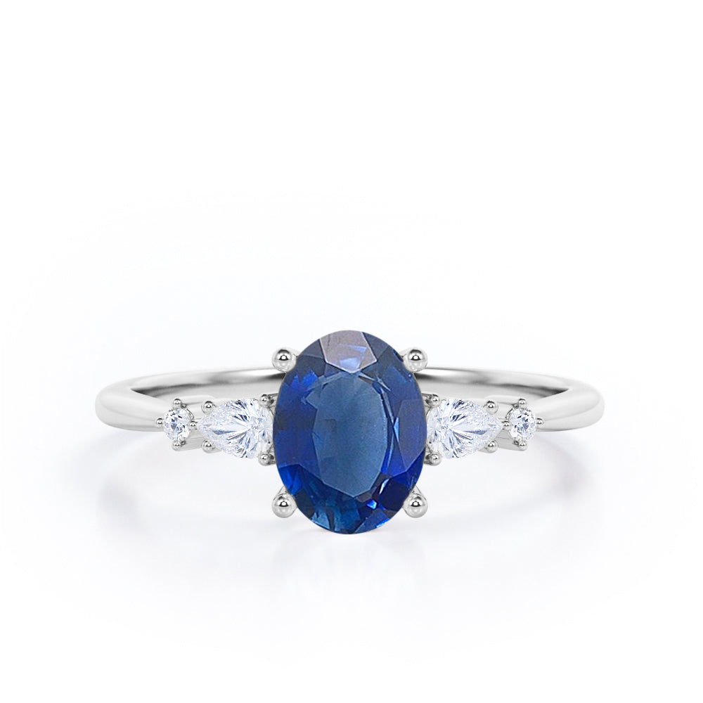 Five Stone 0.6 Ct Oval Cut Lab Sapphire Engagement Ring