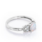 Tiny Butterfly 0.5 carat Round Opal and Diamond Vintage Engagement Ring in Rose Gold