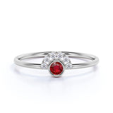 Petite Round Cut Ruby and Diamond Curve Engagement Ring in White Gold