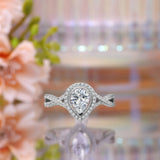 Infinity Style 1.50 Carat Teardrop Shape Moissanite and Diamond Halo Engagement Ring in White Gold