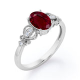 Swirly 0.5 carat Oval Lab Ruby and Diamonds Antique Engagement Ring in Rose Gold