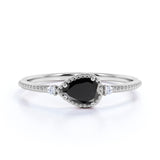 Sideways 1.10 Carat Pear Lab Black Diamond and 3 Stone Elegant Engagement Ring in White Gold