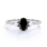 Freshwater Pearl 1.35 Carat Oval Lab Black Diamond and Shared Prong Engagement Ring in White Gold