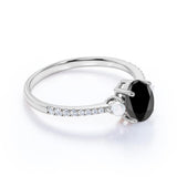 Freshwater Pearl 1.35 Carat Oval Lab Black Diamond and Shared Prong Engagement Ring in White Gold
