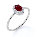 Dainty 0.65 Carat Oval Shape Lab Ruby and Diamond Halo Classic Engagement Ring in White Gold