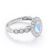 Vintage Floral Halo 0.7 carat Oval and Round Moonstone and diamond Engagement Ring in Rose Gold