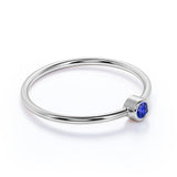 Bezel Set Round Midnight Blue Lab-Created Sapphire and Petite Solitaire Engagement Ring in White Gold