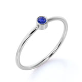 Bezel Set Round Midnight Blue Lab-Created Sapphire and Petite Solitaire Engagement Ring in White Gold