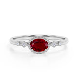 Bestselling East West 1.10 Carat Oval Cut Lab Ruby and Diamond Bezel Engagement Ring in White Gold