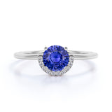 Unique 1.15 Carat Round Navy Blue Sapphire and Diamond Curved Engagement Ring in White Gold