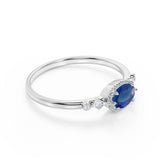 Bestselling East West 1.10 Carat Oval Cut Vivid Blue Sapphire and Diamond Bezel Engagement Ring in White Gold