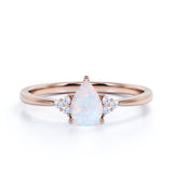 1.15 Ct Pear Cut Lab Created Opal Seven Stone Engagement Ring
