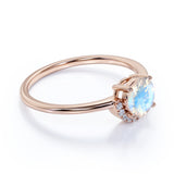 Unique 1.15 Carat Round Blue Flash Moonstone and Diamond Curved Engagement Ring in Rose Gold