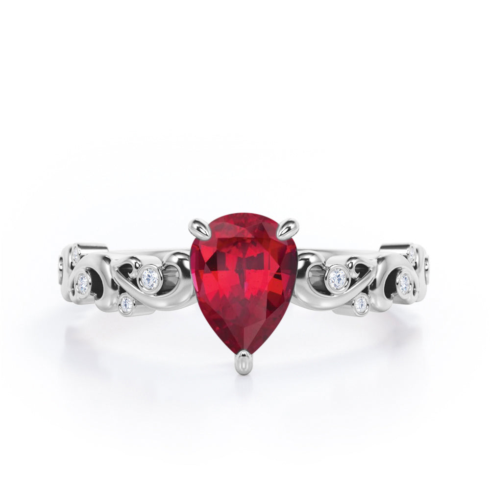 Vintage Style Scroll 0.5 carat Pear Lab Ruby and Diamond Engagement Ring in Rose Gold