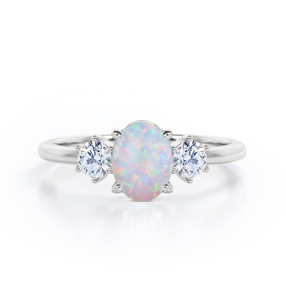Three Stone 1.1 Ct Oval Cut Lab Created Opal Engagement Ring