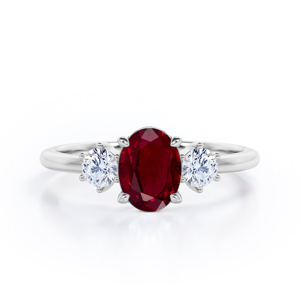 Trio 0.80 ct Oval Lab-Created Ruby Engagement Ring