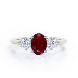 Trio 0.80 ct Oval Lab-Created Ruby Engagement Ring