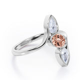Distorted Line Three Stone 1 carat Oval and Pear Morganite and moissanite Ring in Rose Gold