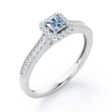 Halo Design 1.25 Carat Princess Cut Aquamarine Milgrain-Bordered Pave-Channel Engagement Ring in White Gold