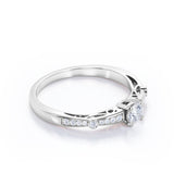 Bowtie 0.7 carat Round Moissanite and Diamond Pinched Shank Anniversary Ring in White Gold