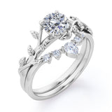 Fairytale 0.55 carat Round Moissanite and Diamond Wedding Ring Set in Black Gold