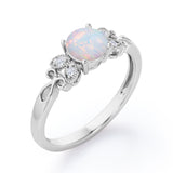 Tiny Butterfly 0.5 carat Round Opal and Diamond Vintage Engagement Ring in Rose Gold