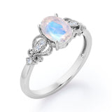Swirly 0.5 carat Oval Moonstone and Diamonds Antique Engagement Ring in Rose Gold