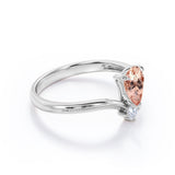 Two Stones 0.55 carat Pear Morganite and Moissanite Nestled Engagement Ring in White Gold