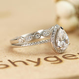 1.50 Carat pear cut Moissanite Wedding Ring Set in 18k White Gold Over Silver