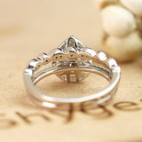 1.50 Carat pear cut Moissanite Wedding Ring Set in 18k White Gold Over Silver