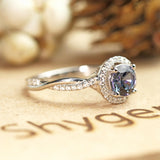 Simple Halo 1.50 Carat Round Cut Created Alexandrite and Diamond Infinity Pave Engagement Ring