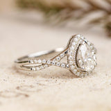 Infinity Style 1.50 Carat Teardrop Shape Moissanite and Diamond Halo Engagement Ring in White Gold