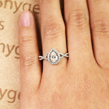 Infinity Style 1.50 Carat Teardrop Shape Moissanite and Diamond Halo Engagement Ring in White Gold