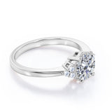 Tapered Classic 0.55 carat Round Moissanite and Diamond Engagement Ring in White Gold