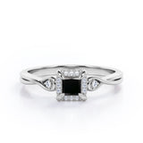 Prong and Halo 0.6 carat Princess Black Diamond Twisted Shank Engagement Ring in White Gold