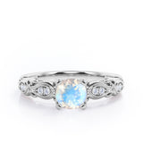 Decorative Basket Prong 0.5 carat Round Moonstone and Diamond Nature-Inspired Ring in Rose Gold