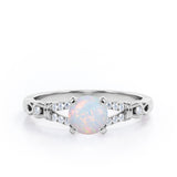 Split Shank 0.6 carat Round Opal and Diamond Engagement Ring in Rose Gold