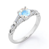 Split Shank 0.6 carat Round Moonstone and Diamond Engagement Ring in Rose Gold