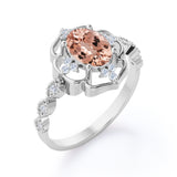 Colossal Flower 0.65 carat Oval Morganite and Moissanite Decorative Halo Engagement Ring in White Gold