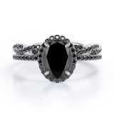 Four-Prong Halo 1.75 TCW Oval-Shaped Lab Created Black Diamond Pave Twisted Eternity Bridal Set in White Gold