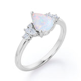 Seven Stone 0.6 Ct Pear Cut Lab Created Opal Engagement Ring