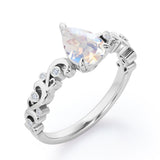 Vintage Style Scroll 0.5 carat Pear Moonstone and Diamond Engagement Ring in Rose Gold