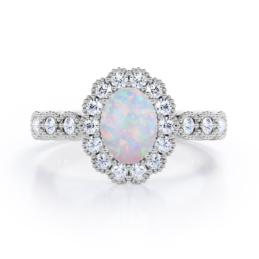 Vintage Floral Halo 0.7 carat Oval and Round Opal and diamond Engagement Ring in Rose Gold