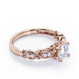 Decorative Basket Prong 0.5 carat Round Moissanite and Diamond Nature-Inspired Ring in Rose Gold