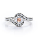Wrapped Round 0.65 carat Round Morganite and Moissanites Bypass Engagement Ring in Rose Gold