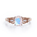Swirly 0.5 carat Oval Moonstone and Diamonds Antique Engagement Ring in Rose Gold